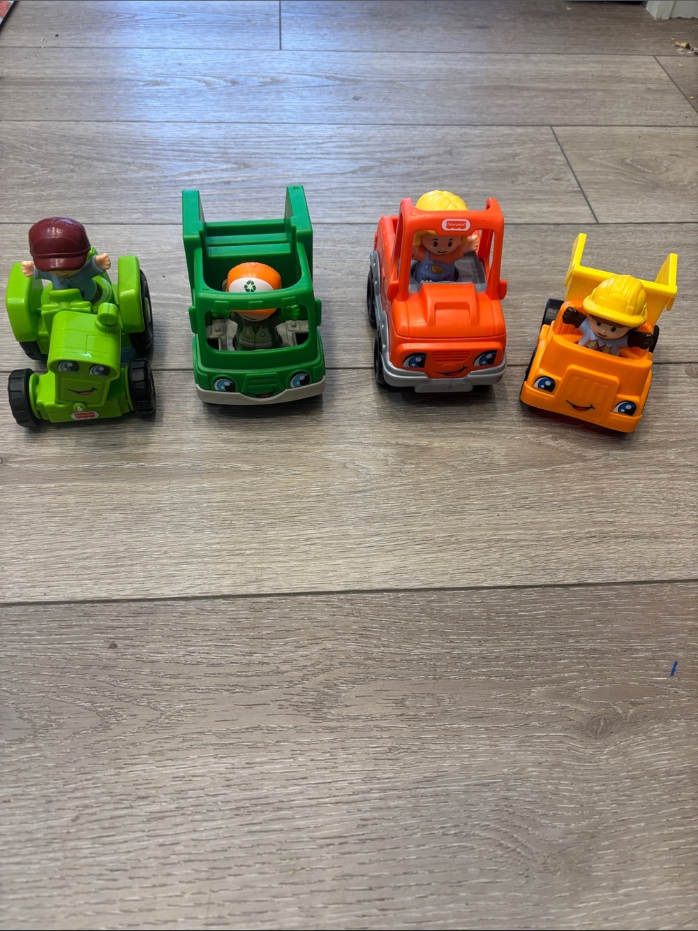 4 Fisher Price Little People vehicles and people